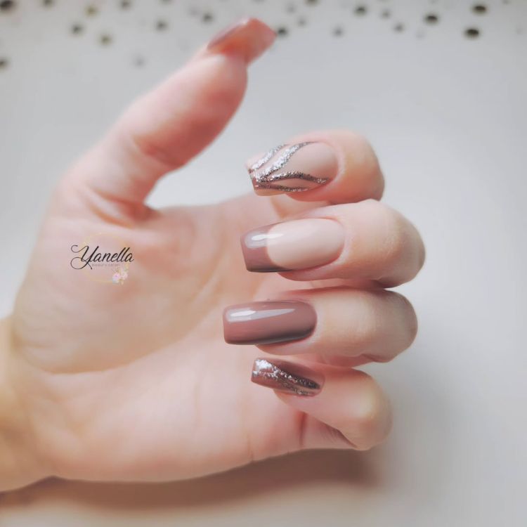 Elegant nude and silver glitter nail design
